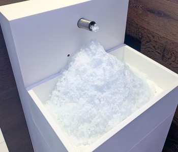 fuente de hielo referencia corian instalación planta construcción foto