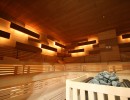 foto sauna finlandese stufa a legna illuminazione indiretta costruzione impianti progettazione impianti wellness spa sauna elementi di progetto monaco di baviera fuoco e ghiaccio wellness spa group gmbh