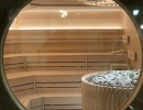 bild7 sauna fenêtre ronde éclairage banc lattes panneaux en bois banc construction établissement bien-être piscine intérieure heslach stuttgart feu glace sauna groupe