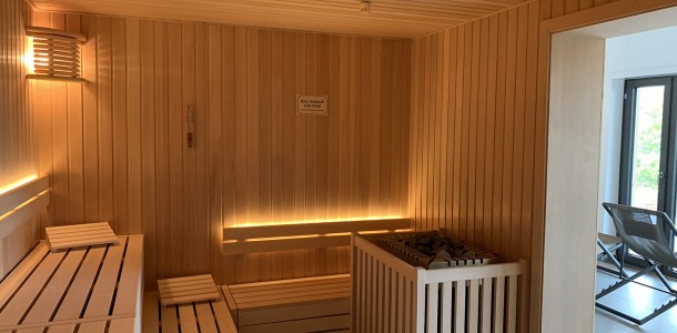 photo finnish sauna wooden benches lighting plant construction plant planning wellness spa furniture loungers sauna project tannenhof hotel feldberg fire and ice wellness spa group gmbh